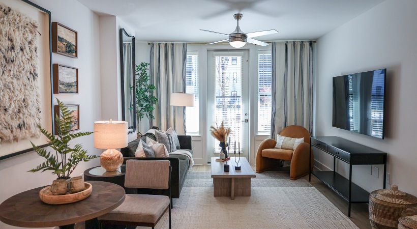 A living room with a large window A living room with a large window